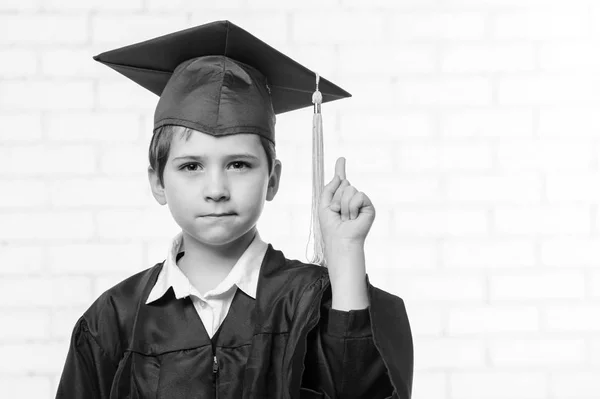 Serious primary school boy points to you with his finger — Stock Photo, Image