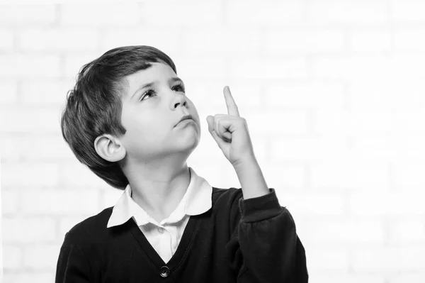 Serious primary school boy points to you with his finger — Stock Photo, Image