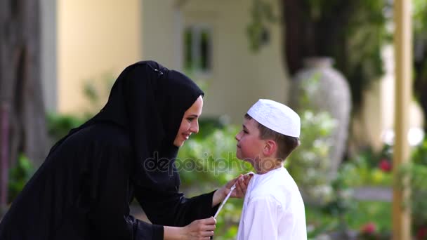 Arabic mother and son together having fun. — Stock Video