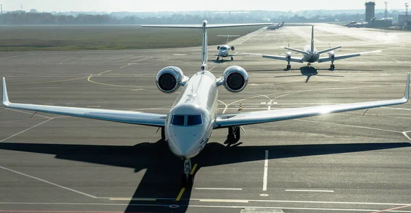 Private jet planes  on the landing line.