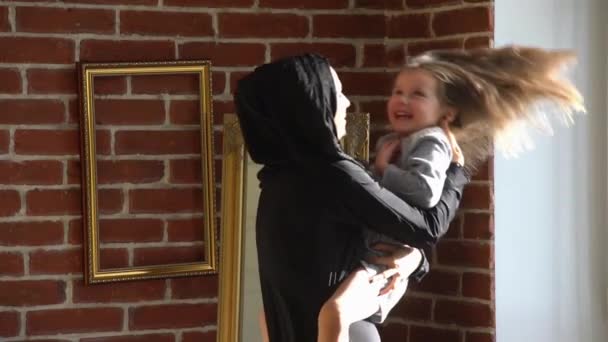 Happy Arabic boy jumping on sofa. — Stock Video