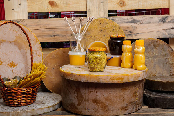 Various bee products - honey, honey with wax and propolis. Products of livelihoods of bees. Wax. Cells. Honey.Beekeeping.