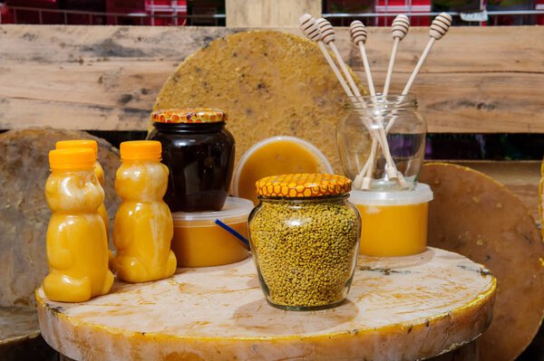 Various bee products - honey, honey with wax and propolis. Products of livelihoods of bees. Wax. Cells. Honey.Beekeeping.