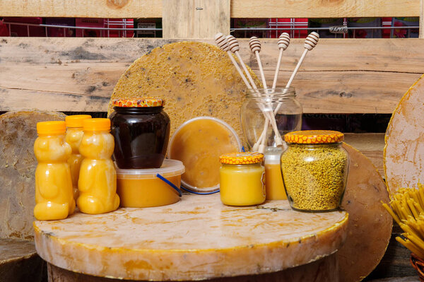 Various bee products - honey, honey with wax and propolis. Products of livelihoods of bees. Wax. Cells. Honey.Beekeeping.