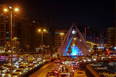 Dubai, Birleşik Arap Emirlikleri - Aralık 16: Saat Kulesi dolambaçlı Deira 16 Aralık 2017 yılında Dubai Deira, Birleşik Arap Emirlikleri