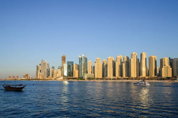 View of various skyscrapers in Jumeirah Beach Residence (JBR) with stunning turquoise waters as foreground — Stock Photo, Image