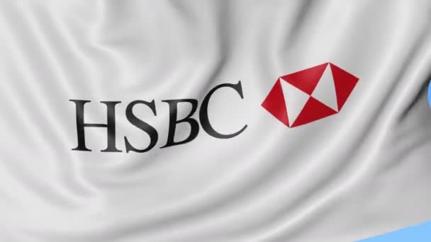 Zbliżenie macha flagą z Hsbc logo, Płynna pętla, niebieskie tło. Redakcji animacji. 4 k Prores, alfa — Wideo stockowe