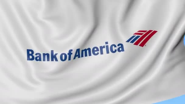 Fechar a bandeira acenando com logotipo do Banco da América, loop sem costura, fundo azul. Animação editorial. 4K ProRes, alfa — Vídeo de Stock