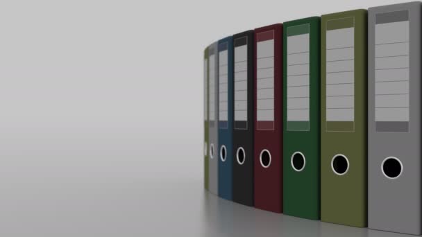 Colored office binders rotation, shallow focus. 4K seamless loopable clip — Stock Video