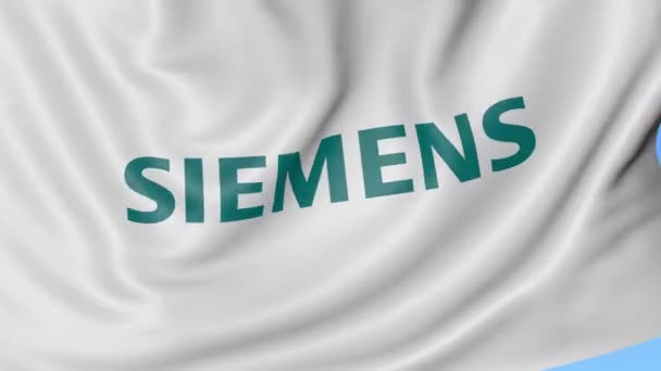 Primer plano de la bandera ondeante con el logotipo de Siemens, lazo sin costuras, fondo azul. Animación editorial. 4K ProRes, alfa — Vídeos de Stock