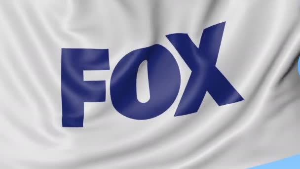 Закрываем восковой флаг с логотипом Fox Broadcasting Company, безмордым лапником, синим фоном. Редакционная анимация. 4K ProRes, альфа — стоковое видео