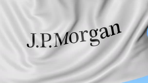 Primer plano de la bandera ondeante con el logotipo de J.P. Morgan, lazo sin costuras, fondo azul. Animación editorial. 4K ProRes, alfa — Vídeos de Stock