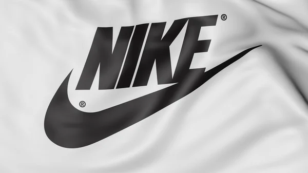 Primer plano de la bandera ondeante con inscripción y logotipo de Nike, representación 3D —  Fotos de Stock