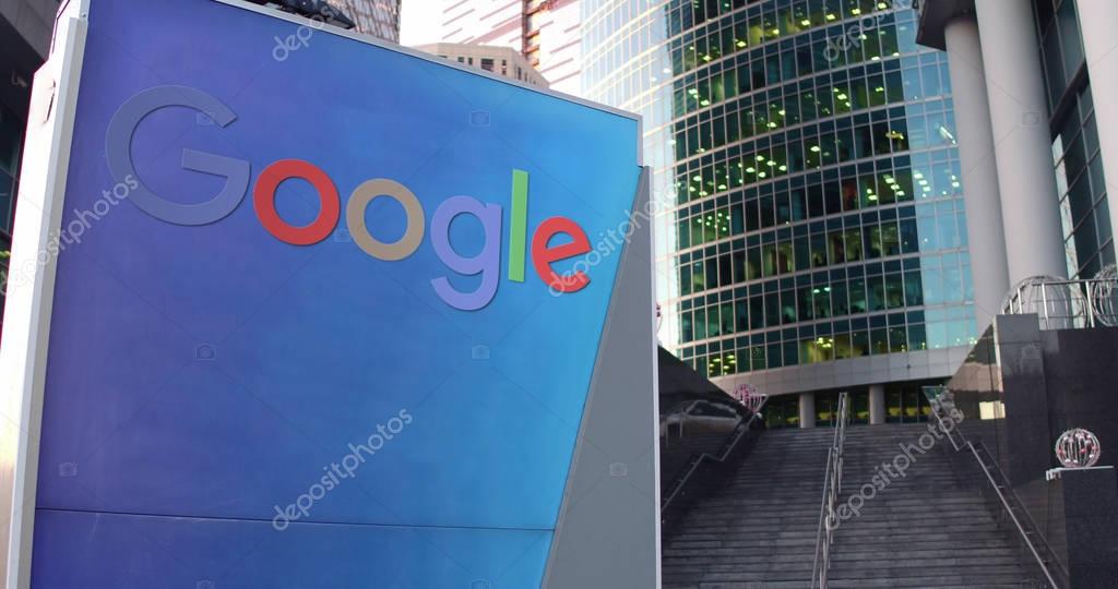 Street signage board with Google logo. Modern office center skyscraper and stairs background. Editorial 3D rendering United States