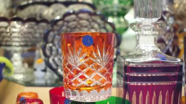 PRAGUE, CZECH REPUBLIC - DECEMBER 3, 2016. 4K steadicam close up video of famous Bohemian glass or Bohemia crystal pieces in a showcase — Stock Video