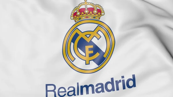 Primer plano de la bandera ondeante con el Real Madrid C.F. logo club de fútbol —  Fotos de Stock