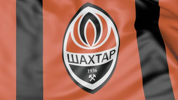 Zbliżenie: macha flagą z logo klubu piłki nożnej Fc Shakhtar Donetsk — Zdjęcie stockowe