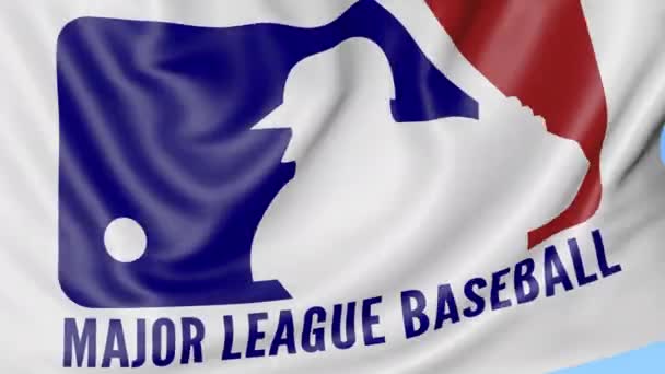 Close-up da bandeira acenando com o logotipo MLB Major League Baseball, loop sem costura, fundo azul. Animação editorial. 4K — Vídeo de Stock