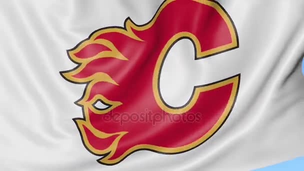 Close-up of waving flag with Calgary Flames NHL hockey team logo, seamless loop, blue background. Editorial animation. 4K — Stock Video