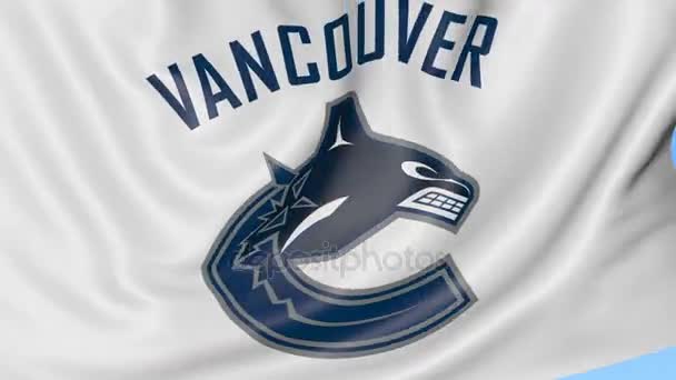 Gros plan du drapeau avec le logo de l "équipe de hockey des Canucks de Vancouver, boucle transparente, fond bleu. Animation éditoriale. 4K — Video