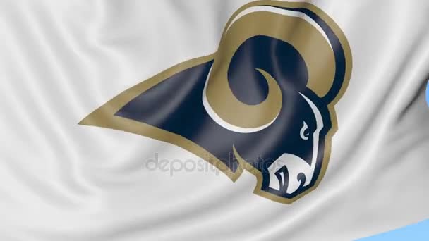 Close-up of waving flag with Los Angeles Rams NFL American football team logo, seamless loop, blue background. Editorial animation. 4K — Stock Video