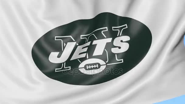 Close-up of waving flag with New York Jets NFL American football team logo, seamless loop, blue background. Editorial animation. 4K — Stock Video