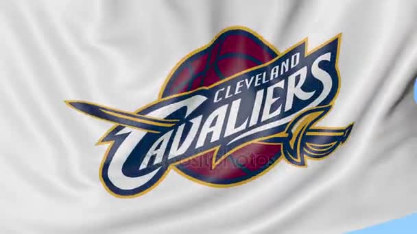 Close-up van zwaaien vlag met Cleveland Cavaliers Nba basketbal team logo, naadloze loops, blauwe achtergrond. Redactionele animatie. 4k — Stockvideo