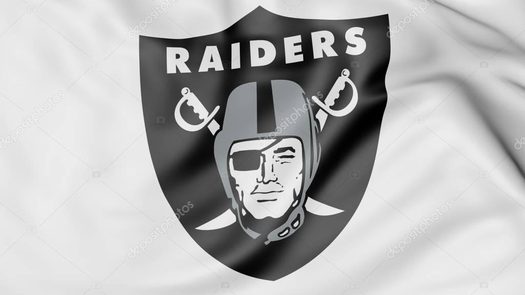 Close-up of waving flag with Oakland Raiders NFL American football team logo, United States