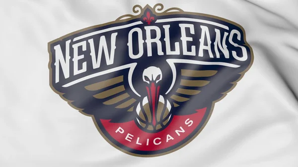 Primer plano de la bandera ondeando con el logotipo del equipo de baloncesto de la NBA Pelicans de Nueva Orleans, representación 3D — Foto de Stock