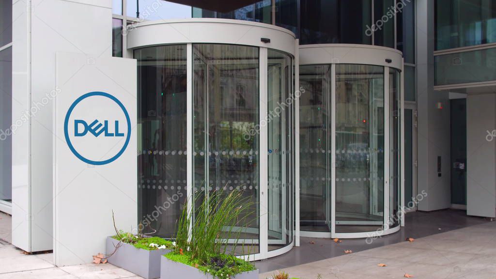 Street signage board with Dell Inc. logo. Modern office building. Editorial 3D United States