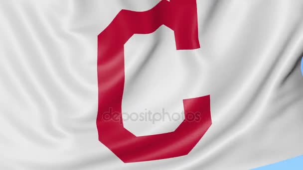 Close-up van zwaaien vlag met Cleveland Indians Mlb honkbal team logo, naadloze loops, blauwe achtergrond. Redactionele animatie. 4k — Stockvideo