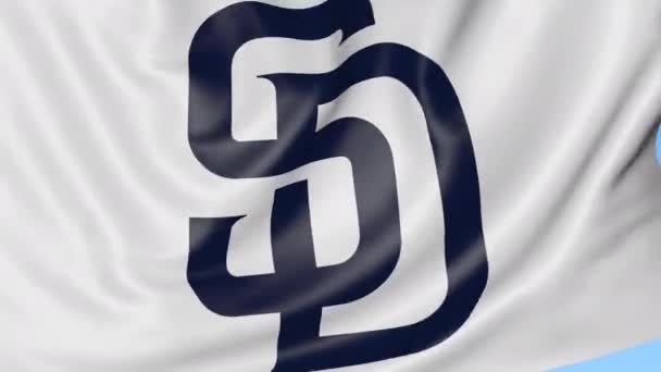 Primo piano della bandiera sventolante con il logo della squadra di baseball di San Diego Padres MLB, anello senza cuciture, sfondo blu. Animazione editoriale. 4K — Video Stock