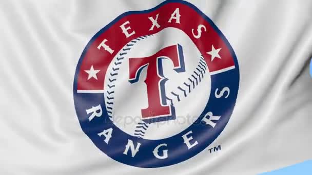 Gros plan du drapeau agitant avec le logo de l'équipe de baseball Texas Rangers MLB, boucle transparente, fond bleu. Animation éditoriale. 4K — Video