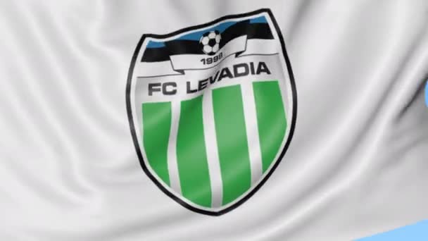 挥舞着旗子用 Levadia 塔林足球俱乐部徽标、 无缝环、 蓝色背景的特写镜头。编辑动画。4 k — 图库视频影像