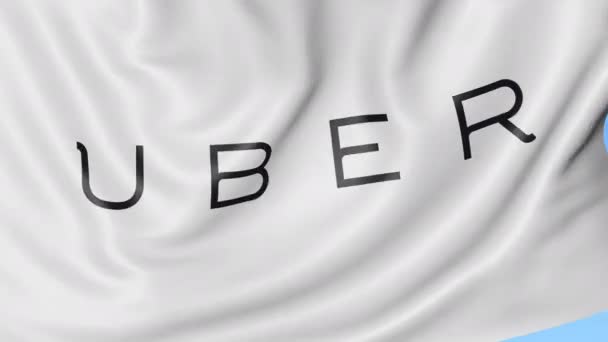 Primer plano de la bandera ondeante con el logotipo de Uber Technologies Inc., bucle sin costuras, fondo azul, animación editorial. 4K ProRes — Vídeos de Stock