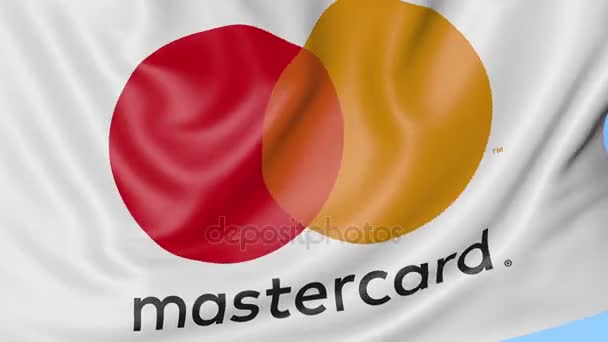 Крупный план размахивания флагом с логотипом MasterCard, бесшовный цикл, синий фон, редакционная анимация. 4K ProRes — стоковое видео