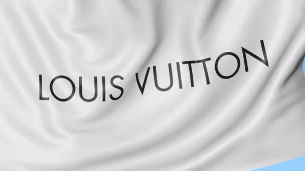 Крупный план размахивания флагом с логотипом Louis Vuitton, бесшовный цикл, синий фон, редакционная анимация. 4K ProRes — стоковое видео