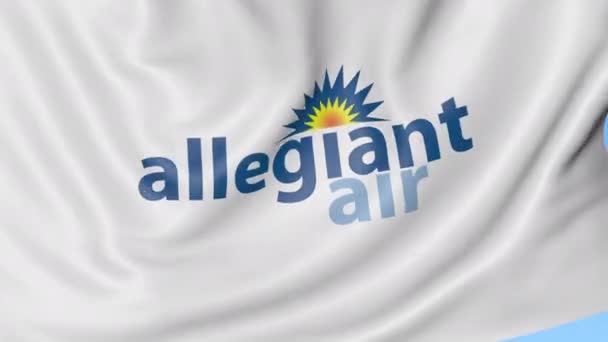 Drapeau ondulé d'Allegiant Air sur fond de ciel bleu, boucle transparente. Éditorial animation 4K — Video