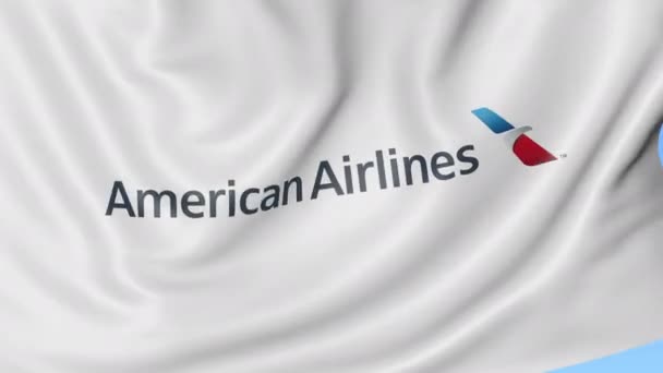 Drapeau agitant d'American Airlines sur fond de ciel bleu, boucle transparente. Éditorial animation 4K — Video