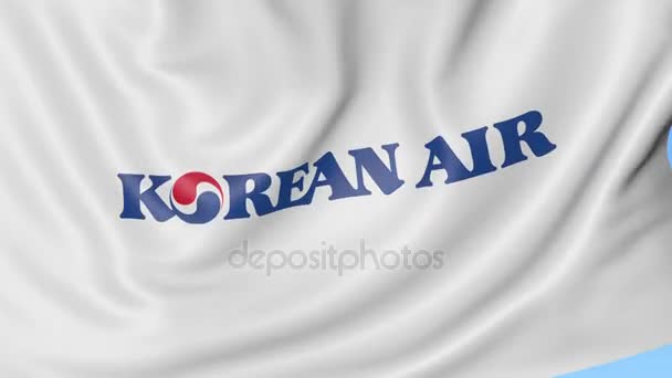 Drapeau ondulé de Korean Air sur fond de ciel bleu, boucle transparente. Éditorial animation 4K — Video