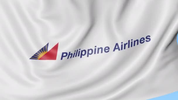 Drapeau agitant de Philippine Airlines sur fond de ciel bleu, boucle transparente. Éditorial animation 4K — Video