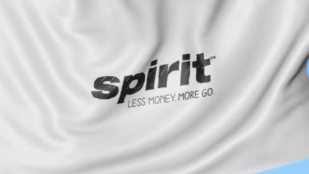 Ondeando la bandera de Spirit Airlines contra el fondo azul del cielo, lazo sin costuras. Animación Editorial 4K — Vídeos de Stock