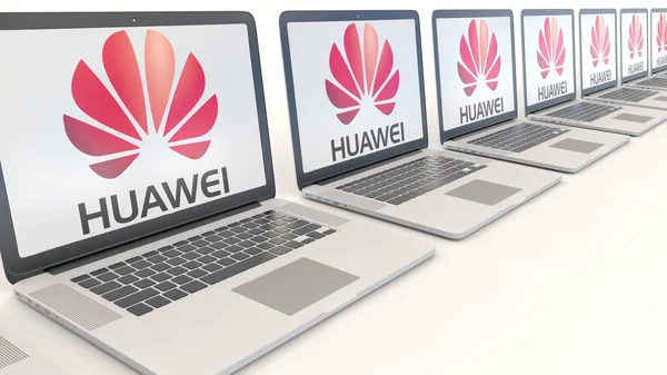 Современные ноутбуки с логотипом Huawei. Концептуальная редакционная 3D рендеринг компьютерных технологий — стоковое фото