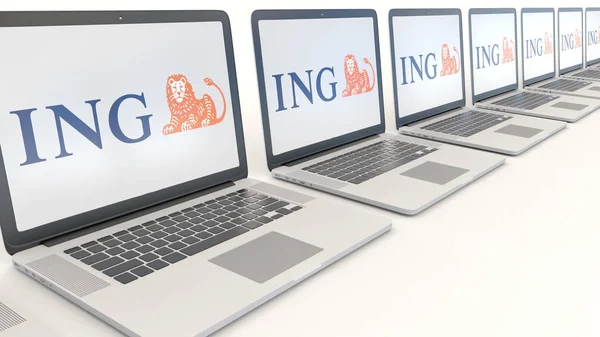 Moderna bärbara datorer med Ing Group logotyp. Dator teknik konceptuella redaktionella 3d rendering — Stockfoto