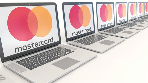 Moderna bärbara datorer med Mastercard logo. Dator teknik konceptuella redaktionella 3d rendering — Stockfoto