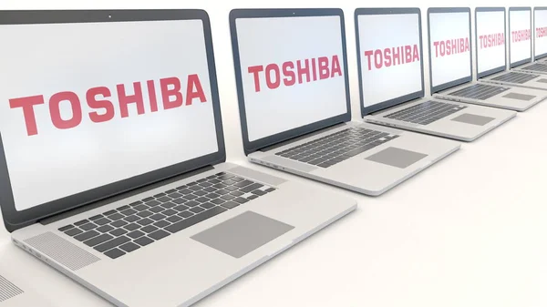 Moderne Laptops mit Toshiba-Firmenlogo. Computertechnologie konzeptionelles redaktionelles 3D-Rendering — Stockfoto