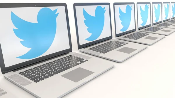 Twitter, Inc logosu ile modern dizüstü bilgisayarlar. Bilgisayar teknolojisi kavramsal içerik 3B oluşturma — Stok fotoğraf