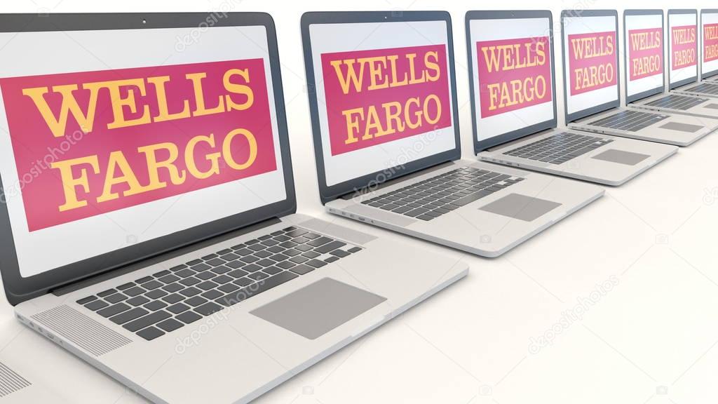 Modern laptops with Wells Fargo logo. Computer technology conceptual editorial 3D