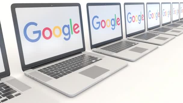 Google logosu ile modern dizüstü bilgisayarlar. Bilgisayar teknolojisi kavramsal editoryal 4k klip, sorunsuz döngü — Stok video