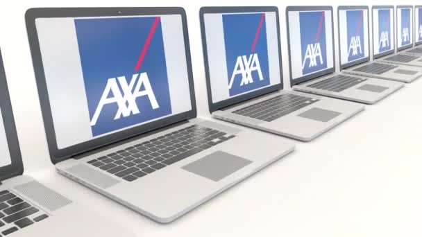 Modern laptops with AXA logo. Computer technology conceptual editorial 4K clip, seamless loop — Stock Video